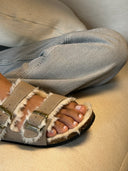Fluffy sand leather sandal with European design featuring exceptional comfort, soft fluffy straps and premium craftsmanship for sophisticated everyday wear