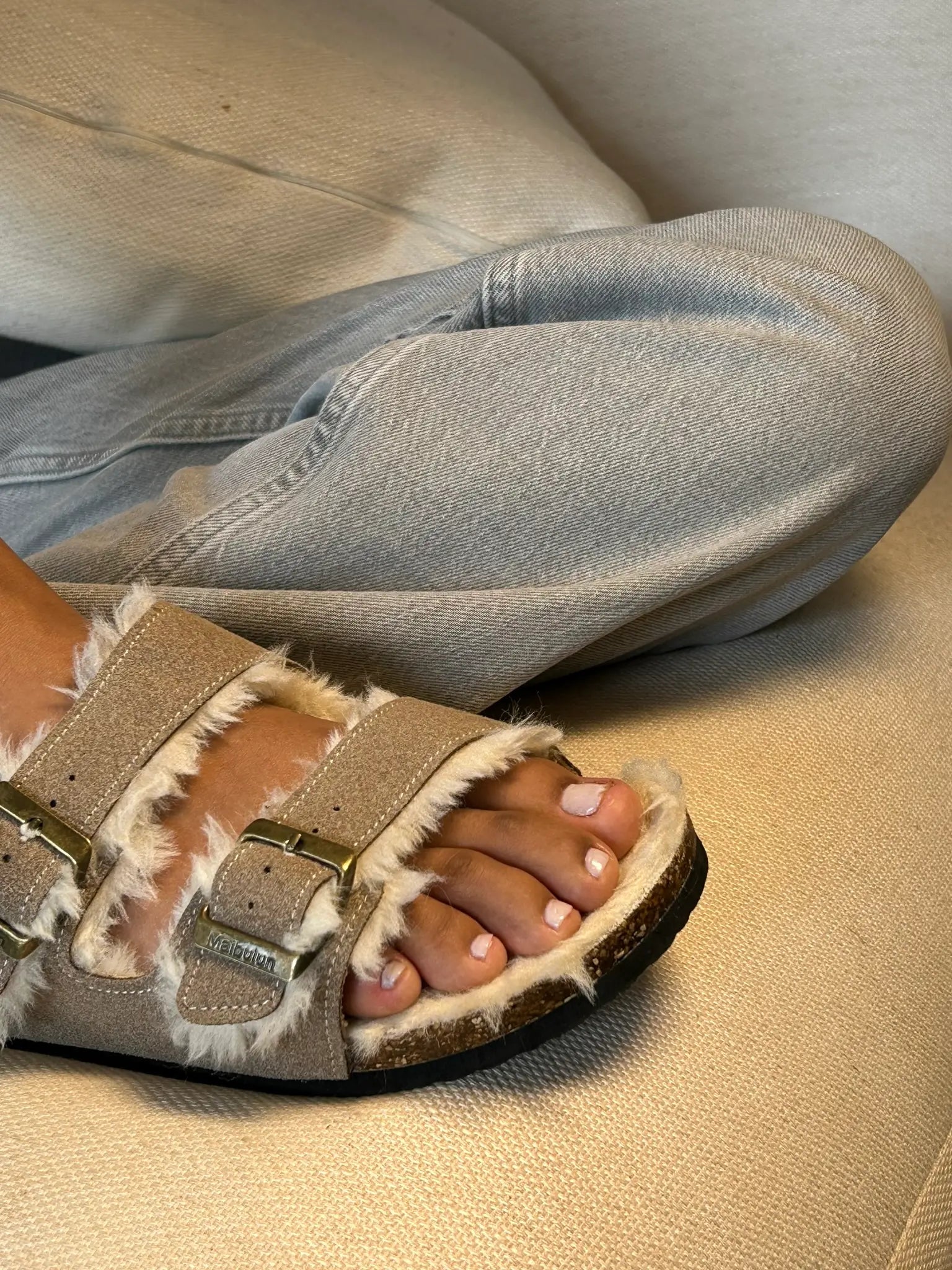 Fluffy sand leather sandal with European design featuring exceptional comfort, soft fluffy straps and premium craftsmanship for sophisticated everyday wear